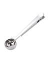 Practical stainless steel measuring cup with built-in clip for precise coffee dosing and easy closing of the open package.